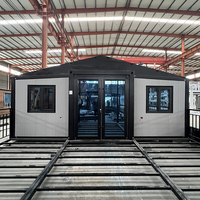 Conteneur magique américain à deux étages Petite maison préfabriquée Paquet plat Île solaire extensible Maison d'hôtel empilable 3 chambres à coucher