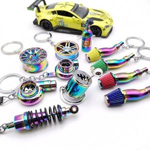 1 pièce Porte-clés de voiture en métal chromé NEO, design moyeu de roue, bouteille de gaz azote, amortisseur, sifflet, Dropshipping - Product Image 1
