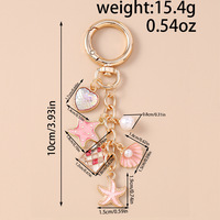 Porte-clés en métal émaillé sur le thème de l'océan, en gros, avec coquillages, coeurs, étoiles de mer, perles et sirènes, breloque compacte pour sac et pendentif