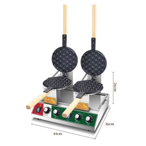Precio de fábrica comercial mecánico Digital doble cabeza giratoria burbuja huevo Puff Mini máquina para hacer gofres equipo de aperitivos - Product Image 1