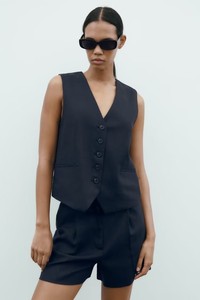 Nouveau style – Ensemble deux pièces tissé élégant avec gilet sans manches plissé à col en V et boutonnage simple, idéal pour les occasions décontractées, mariages et soirées. - Product Image 5