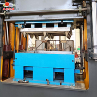 Presse à palettes en bois Machine automatique de fabrication de palettes moulées en sciure de bois