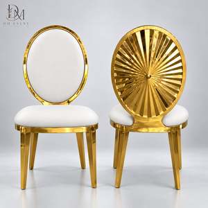 Silla de Acero Inoxidable con Respaldo Ovalado Dorado, Tapicería Blanca y Respaldo con Diseño de Rayos de Sol para Alquiler de Banquetes de Boda y Suministro al por Mayor - Product Image 1