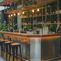 Comptoir de bar portable en acier inoxydable avec un design moderne pour les restaurants, les boîtes de nuit et les bars à jus