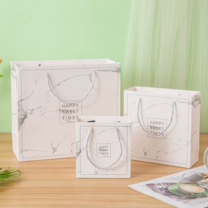 Ready-made INS-style white marble-patterned gift <b>bag</b> high-end ribbon handbag packaging <b>bag</b> color-printed paper <b>bag</b> with bow tie - Product Image 1