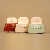 Lampe de nuit minimaliste à LED blanc chaud, alimentée par piles, en forme de grille-pain, avec matériau en silicone pour une utilisation sur le chevet ou sur un bureau