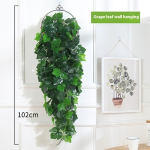 Vente en gros de petite fleur suspendue au mur en Pothos plante à feuilles vertes simulées plante araignée artificielle en rotin pour la décoration intérieure - Product Image 6