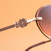 Lunettes de soleil tendance Partagas en gros, avec logo personnalisé, monture ovale sans bords, protection UV400, pour femmes