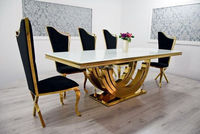 Ensemble de table à manger en marbre gris moderne avec pieds en acier inoxydable chromé pour hôtel ou villa avec chaise de salle à manger