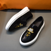 Sneakers décontractées pour homme en cuir véritable, motif à carreaux, semelle intermédiaire et extérieure en caoutchouc, logo brodé à l'extérieur