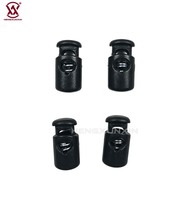 Bouton de verrouillage à ressort en plastique noir robuste avec ressort puissant pour cordons de serrage, lacets et sacs à dos