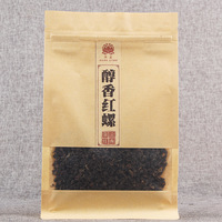 Vente en gros de thé noir du Yunnan escargot doré Dianhong poudre thé noir feuilles mobiles Fengqing arbre ancien OEM arôme de miel 250g
