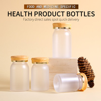 Bouteilles PET transparentes mates de 80/100/120/150ml avec couvercle en grain de bois