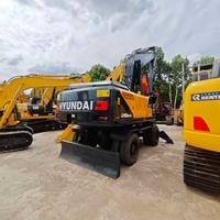 Excavatrice sur pneus d'occasion Hyundai 210W-9T de bonne qualité à prix abordable, fabriquée en Chine, avec moteur Cummins et flèche, à vendre