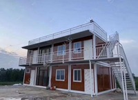 Maison conteneur pliable personnalisée de 20 pieds, maison modulaire préfabriquée avec terrasse, dortoir et bureau pour chantier de construction