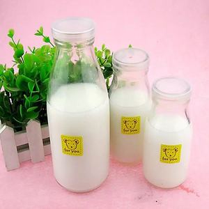 Fabriqué <span class=keywords><strong>En</strong></span> Chine élégant cadeau culture de noix de coco <span class=keywords><strong>en</strong></span> forme de bouteille <span class=keywords><strong>en</strong></span> verre de lait avec bouchon <span class=keywords><strong>en</strong></span> liège <span class=keywords><strong>en</strong></span> verre rond - Product Image 3
