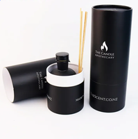 Bouteilles en verre rondes noires de luxe recyclables ensemble de diffuseur de roseau cylindre d'emballage de cadeau tube de papier de bâton d'aromathérapie