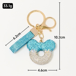 Llavero <span class=keywords><strong>de</strong></span> arcilla con diseño hueco y diamantes <span class=keywords><strong>de</strong></span> imitación (tipo cristal) Junge Cute, colgante para bolso con correa <span class=keywords><strong>de</strong></span> cuero metálica, regalo festivo - Product Image 4