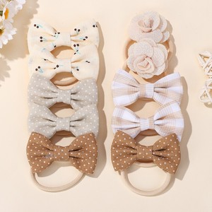 ที่คาดผมผ้ารูปโบว์น่ารักสำหรับเด็ก สไตล์หวานๆ ใช้ได้ทุกวัน ลายดอกไม้สีชมพู ชุดยางรัดผมคุณภาพสูง - Product Image 5