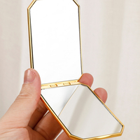 Miroir de maquillage portable pliable double face HD en métal avec finition chromée, personnalisable avec logo – Cadeau promotionnel