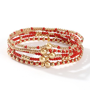 Conjunto navideño de cinco piezas, pulseras de cuentas de semillas de oro, pulseras de hilo con cuentas, joyería, regalo de Navidad, pulseras elásticas apilables - Product Image 1