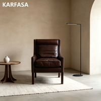 Fauteuil club rétro en cuir marron à dossier haut avec coussin de soutien, fauteuil individuel pour salon, garniture à clous en laiton, pieds en bois