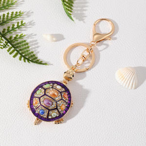 พวงกุญแจใส่เหรียญแฟชั่น ของที่ระลึกสำหรับผู้หญิง ดีไซน์สร้างสรรค์ รูปสัตว์ทะเลเต่า ประดับคริสตัลโอปอลและเพชรเทียม - Product Image 4