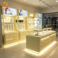Meubles de présentation pour opticien en centre commercial, comptoir vitrine lumineux en bois pour lunettes et lunettes de soleil