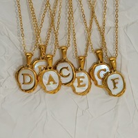 Colliers pendentifs en acier inoxydable avec initiale, lettre de l'alphabet, pièce de monnaie en lave, médaille, accessoire pour vêtements, mariage, anniversaire, usage quotidien