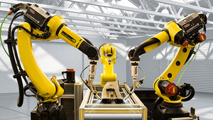 Bras robotisé industriel Fanuc 100iD/8L à 6 axes avec moteur PLC équipé d'une unité de nettoyage de pistolet de soudage TPS 320i PULSE - Product Image 2