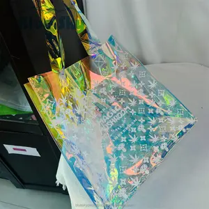 最も人気のあるカスタムプリントロゴPVCホログラフィックトートバッグ生地化粧品包装プラスチックグリッター発光トートバッグ