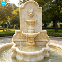 Grande fontaine d'eau commerciale européenne moderne et durable en pierre et marbre beige à niveaux, avec garantie d'un an pour utilisation en extérieur dans les jardins