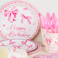 Articles de fête d'anniversaire rose avec nœud papillon pour filles : Assiettes, gobelets, serviettes, nappe et guirlande décorative pour une décoration douce et festive