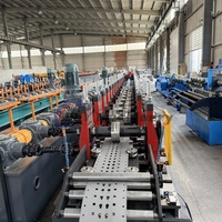 Machine de formage de rouleaux pour rayonnages de supermarché, équipement de production d'étagères de stockage en acier pour systèmes de présentation au détail