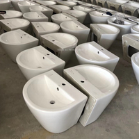 Placard d'eau de toilette de lavage d'commode ronde directe d'usine et ensemble de toilette monobloc en céramique de lavabo suspendu au mur pour la salle de bain