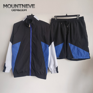 Ensemble de jogging coupe-vent oversize en nylon réfléchissant pour homme, veste imperméable et pantalon de survêtement zippé avec empiècements - Product Image 2