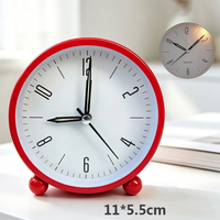 Réveil en métal à quartz avec mécanisme silencieux et veilleuse intégrée, design rond en métal élégant pour bureau et chambre
