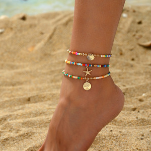 Tobillera de moda <span class=keywords><strong>con</strong></span> dijes de concha, cuentas bohemias, estrella de mar, vieira, colgante de árbol de la paz, cuentas de semillas coloridas y diseño multicapa - Product Image 1