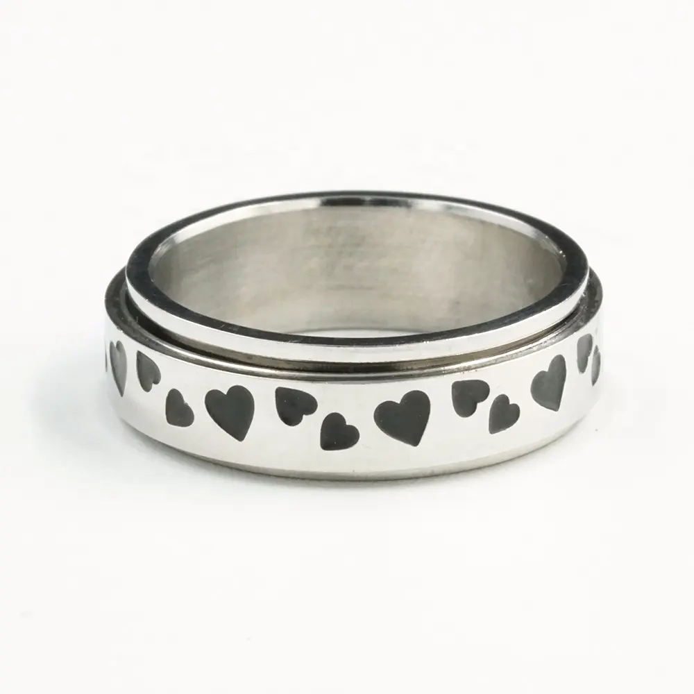 Вращающееся кольцо из нержавеющей стали с изображением сердца для облегчения тревоги