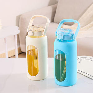 إبريق زجاجي كبير السعة 40 أونصة من البوروسيليكات عالي الجودة مع مقبض منقوش، يشمل غطاء سيليكون وعلامات للحجم - Product Image 2