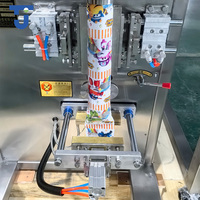 Machine de remplissage et de scellage automatique VFFS multifonctionnelle à 10 têtes pour sachets de bonbons, aliments soufflés, fruits secs, chips et snacks en film