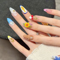 Faux ongles à presser multicolores, style île, avec motifs floraux cerise, forme amande moyenne