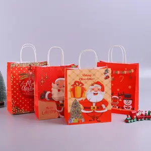 Vente en gros de cadeaux de Noël sacs en papier kraft dessins animés shopping fêtes bonbons emballage sac à main taches sacs en papier personnalisés avec logo