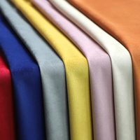 Tissu en velours polyester en gros, tissu en velours doux et lisse pour la confection de vêtements, la décoration de la maison, l'intérieur automobile, l'emballage de cadeaux