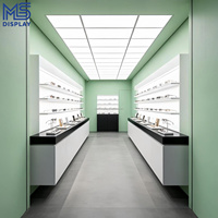 Conception d'intérieur personnalisée pour magasin d'optique, étagère d'exposition de lunettes avec mur arrière LED, mobilier de magasin d'optique, comptoir îlot pour lunettes