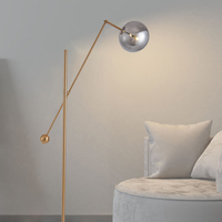 Lampe de sol en marbre doré LED au design artistique simple et moderne, vente en gros, pour salon de luxe, éclairage intérieur