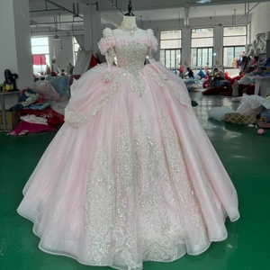 Vestido de Quinceañera Elegante Rosa Mc025 con Cuentas de Perlas en el Corpiño, Manga Larga Transparente y Espalda con Cordones, Estilo Princesa, Jancember - Product Image 2