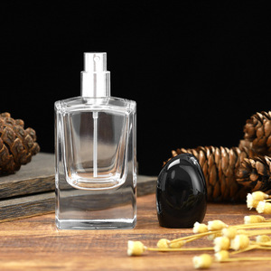 Botella de perfume de lujo con tapa negra, transparente, de vidrio, con atomizador a presión, de 30ml, 50ml, 100ml, para viajes y cuidado personal. - Product Image 2