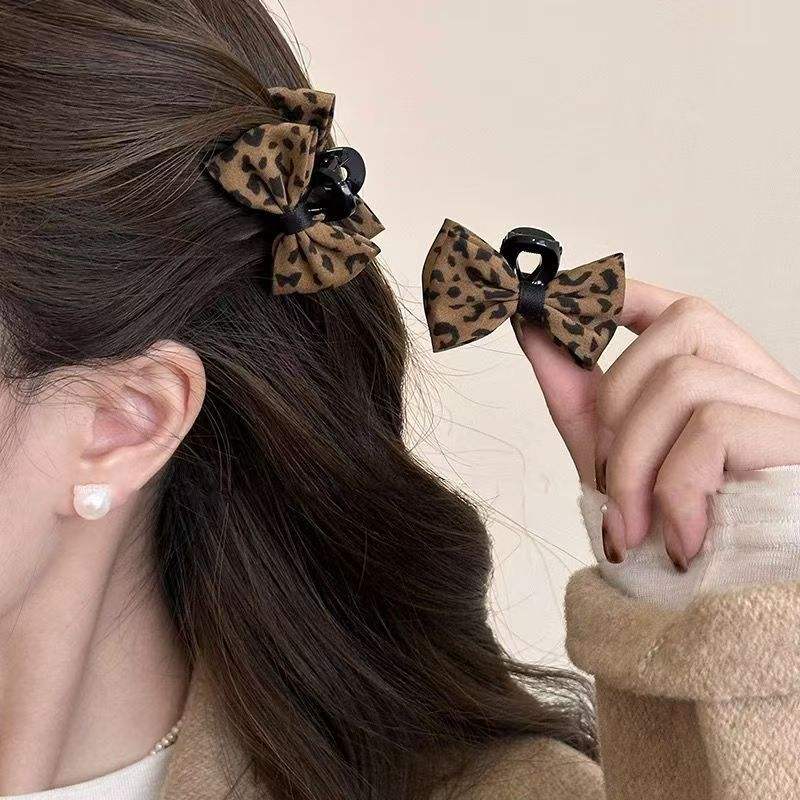 Lot de deux pinces à cheveux motif léopard curry avec nœud - 45 cm