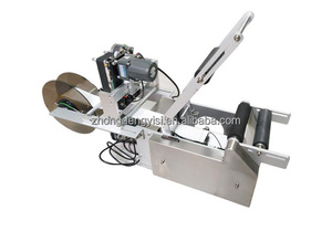 Étiqueteuse semi-automatique de table électrique LT-60D pour bouteilles rondes avec codage de date - Product Image 6
